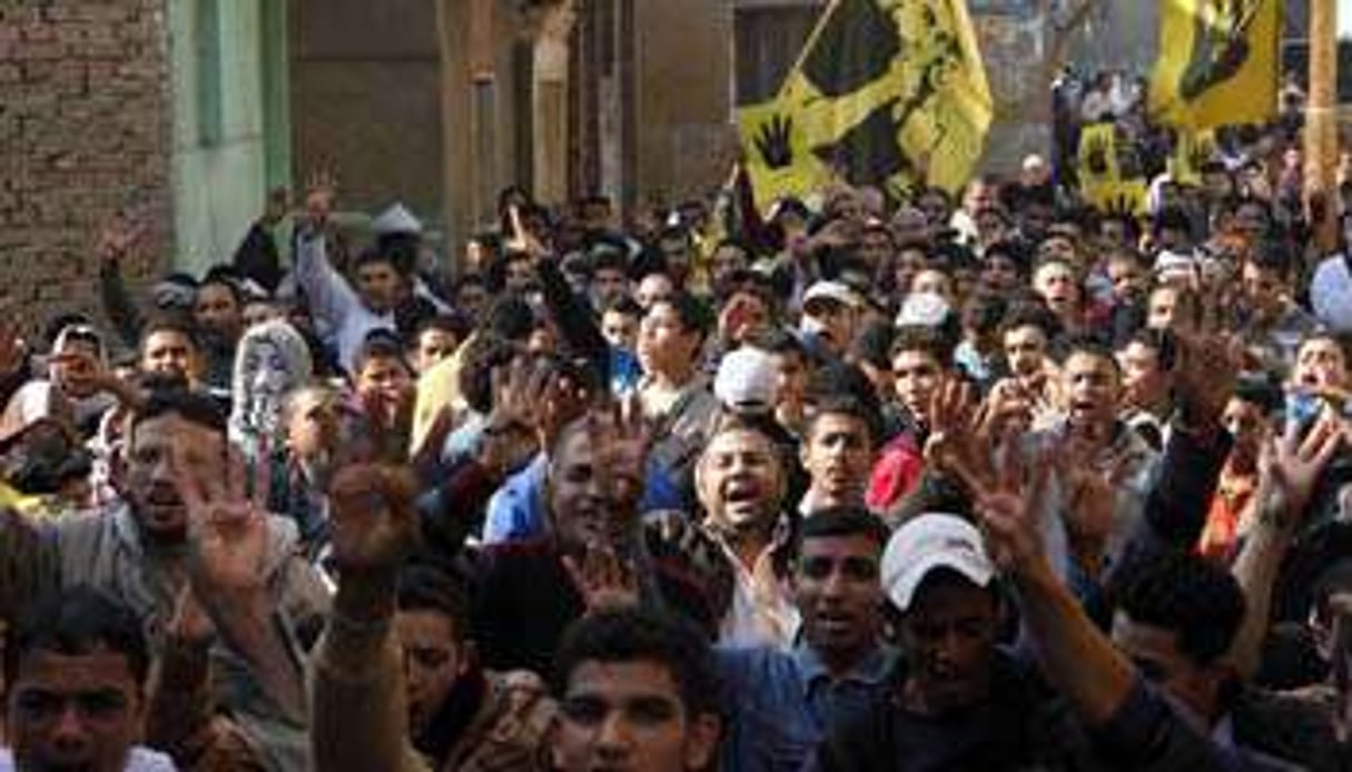 Manifestation des pro-Morsi à Giza, le 14 janvier 2014. © AFP