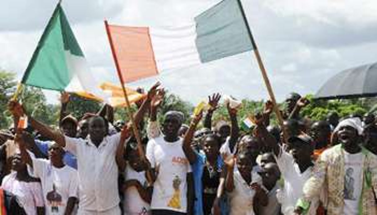 Des Ivoiriens réfugiés au Liberia en octobre 2013. © AFP