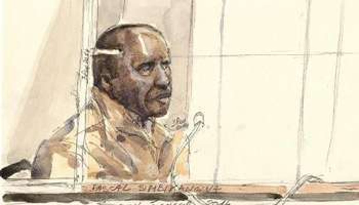 Portrait d’artiste de Pascal Simbikangwa, à la cour d’assises de Paris, le 4 février 2014. © AFP/Benoit Peyrucq