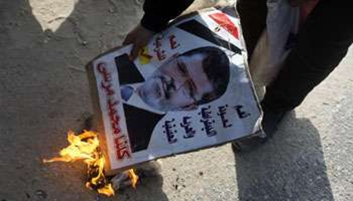 Symbole des Frères au pouvoir, Mohamed Morsi n’a tenu qu’un an et risque la peine de mort. © KHALED DESOUKI/AFP
