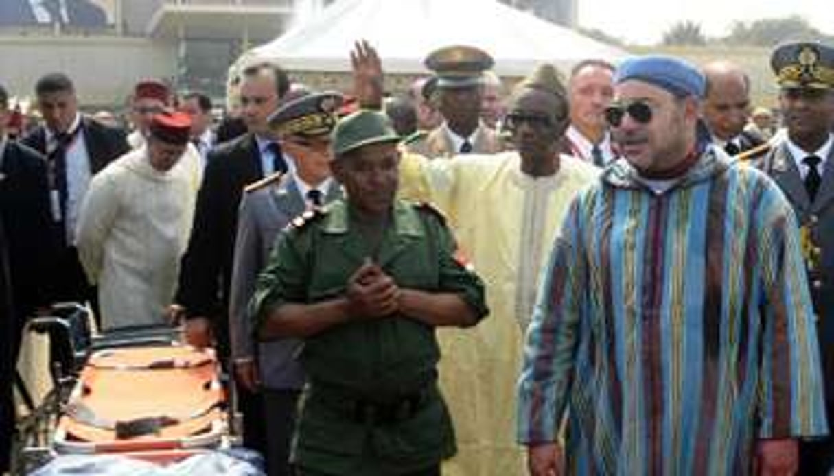 Le roi du Maroc Mohammed VI et le président guinéen Alpha Condé. © AFP