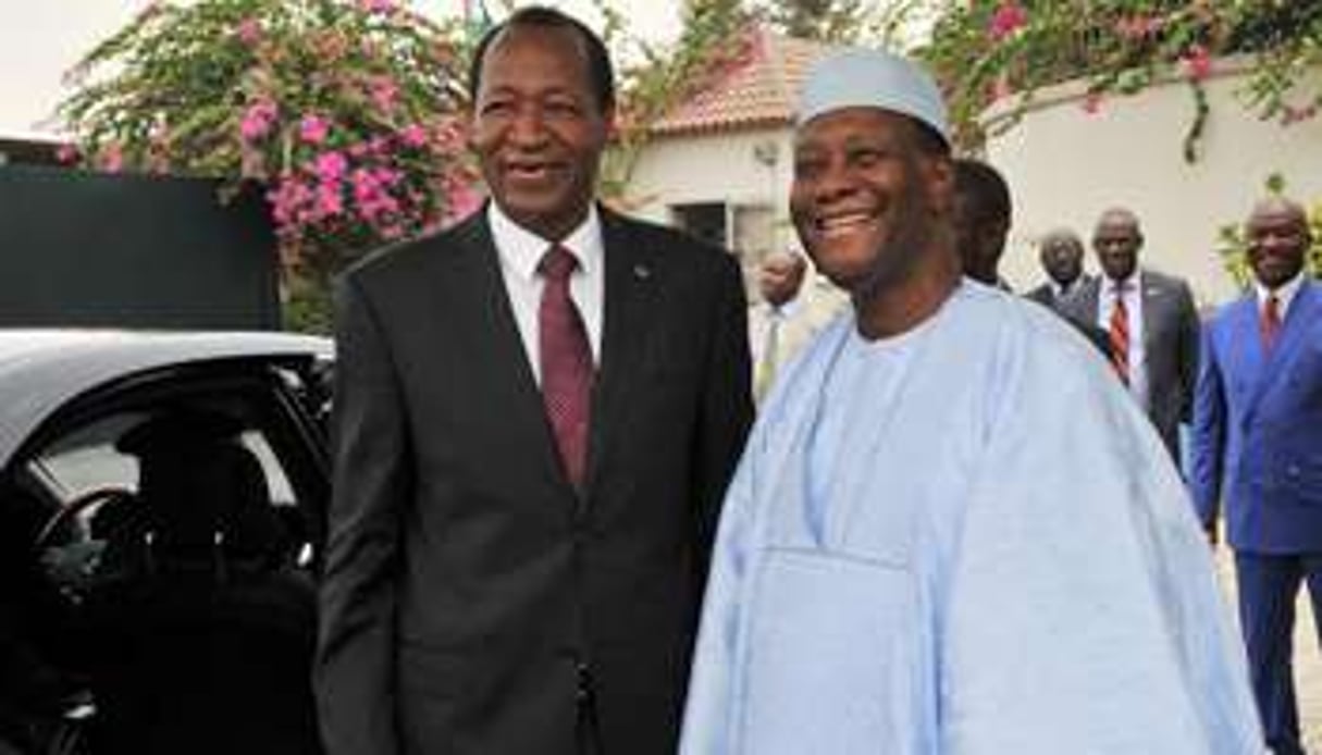 Blaise Compaoré (à g.) et Alassane Ouattara. © AFP