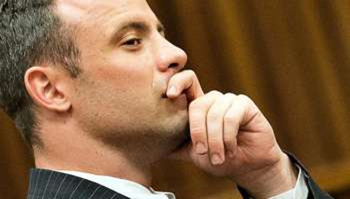 Oscar Pistorius en larmes lors de son procès à Pretoria, le 18 mars 2014. © AFP