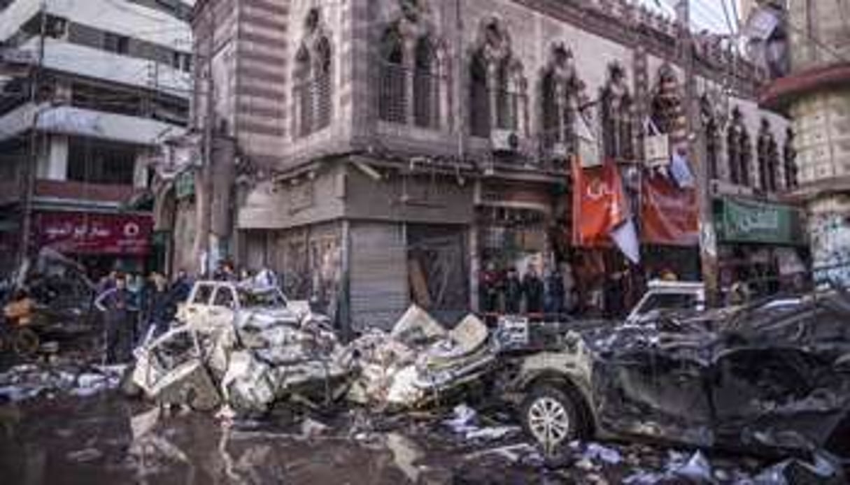 Le QG de la police de Mansoura attaqué en décembre 2013. © AFP