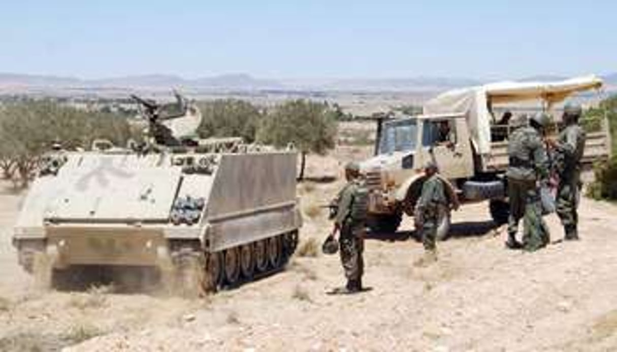 Des soldats tunisiens lors d’une opération le 11 juin 2013 dans la région du Mont Chaambi. © AFP