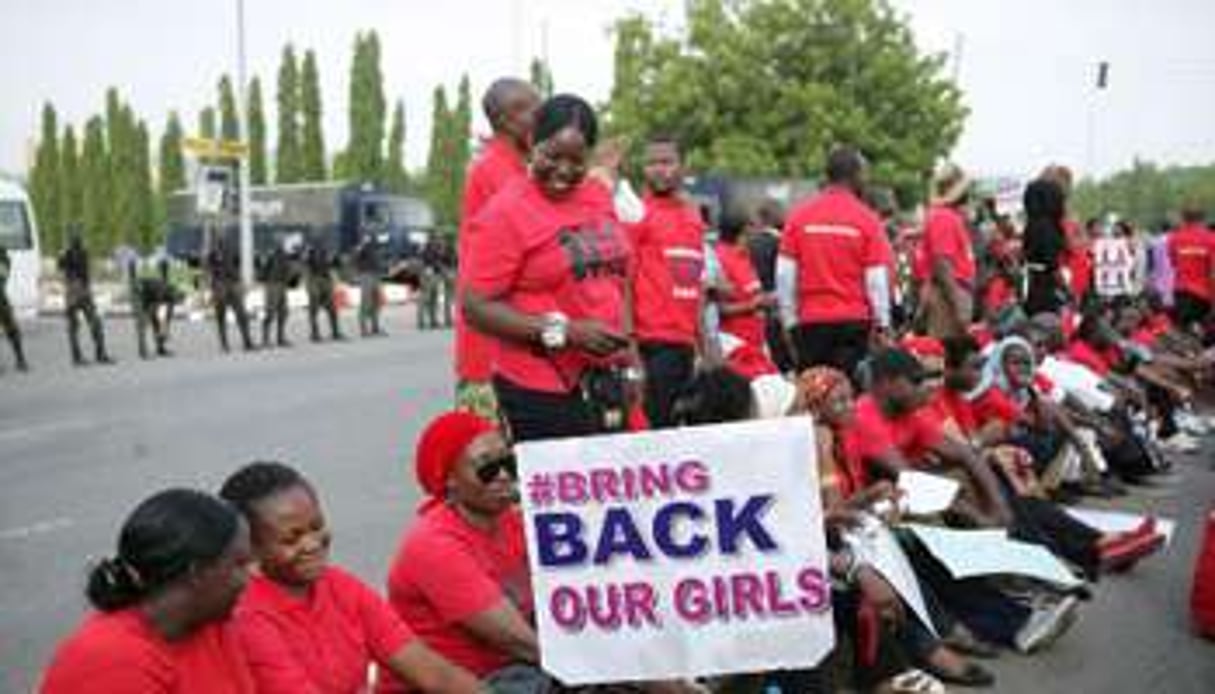Manifestation pour réclamer la libération des 200 lycéennes, à Abuja le 22 mai 2014. © AFP