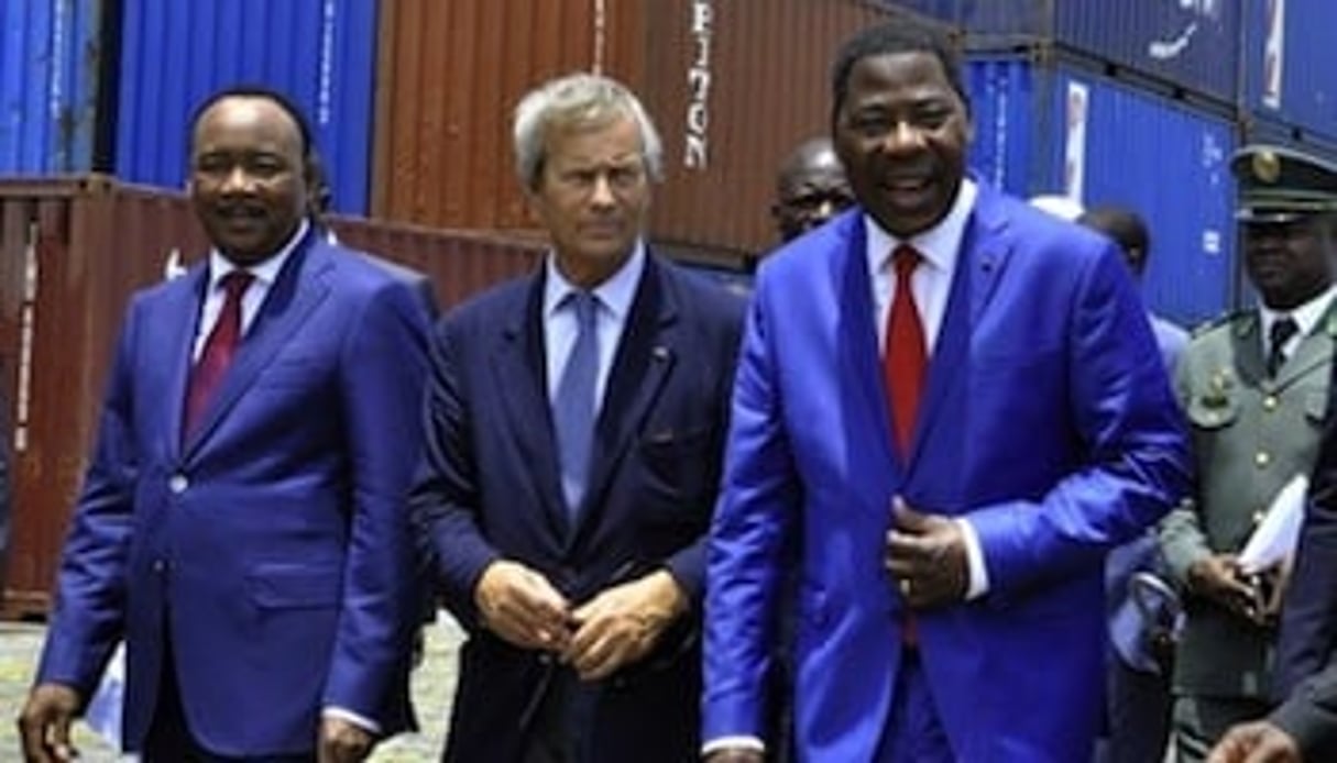 De g à d : Mahamadou Issoufou, Vincent Bolloré et Boni Yayi lors du lancement de la construction de la ligne Cotonou-Niamey, le mardi 9 avril 2014. © Charles Placide/Reuters