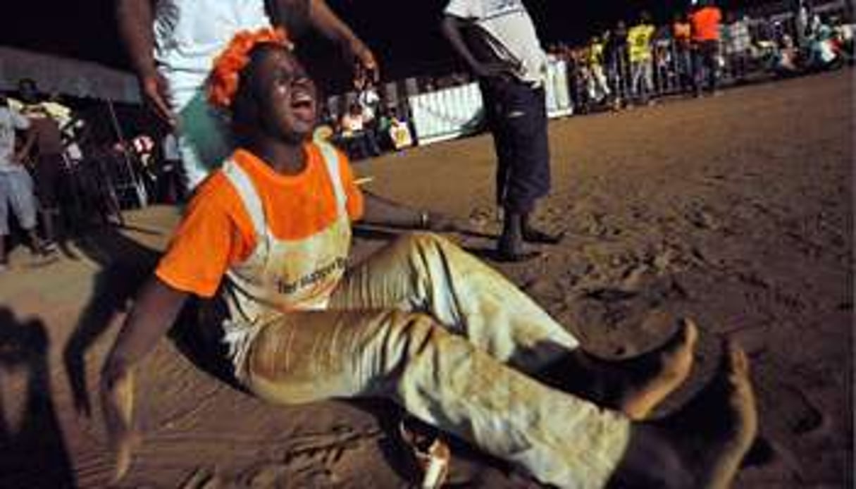 Un supporteur ivoirien lors de l’élimination de la Côte d’Ivoire par l’Algérie à la CAN 2010. © AFP