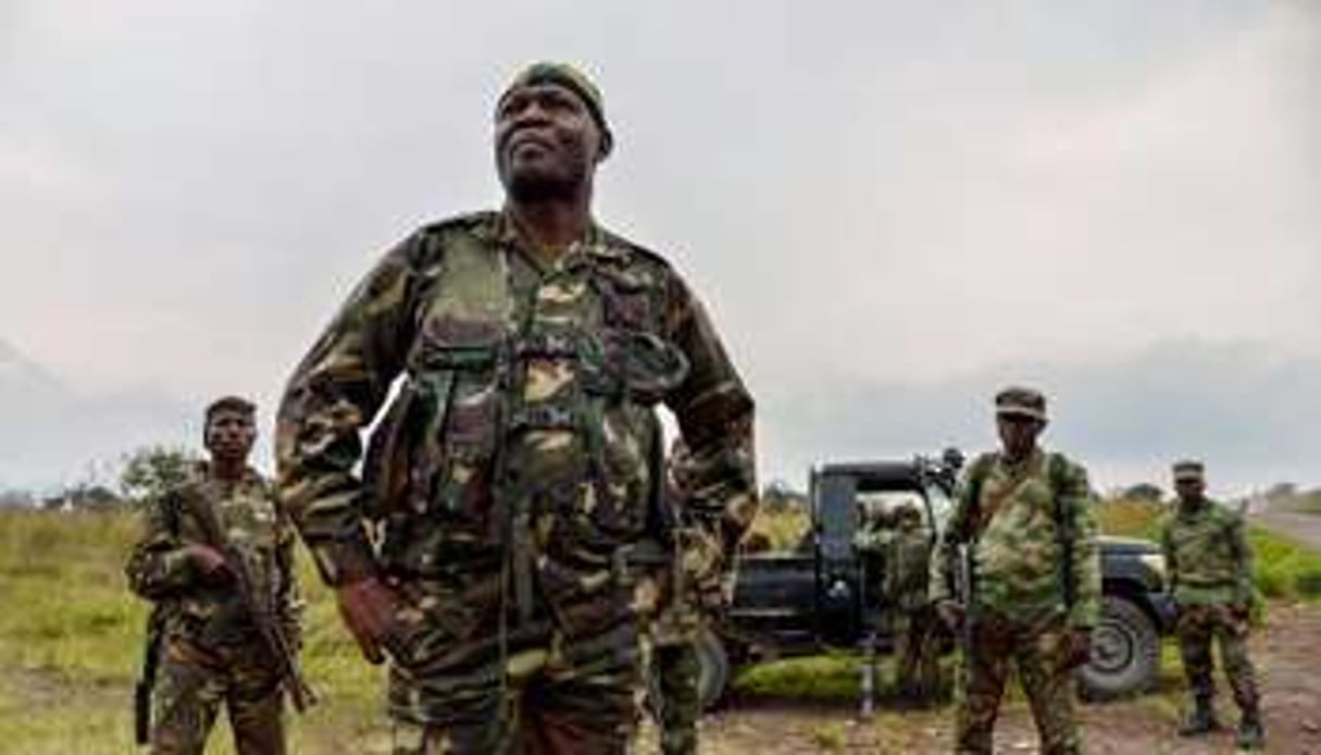 Des soldats de RDC patrouillent à Kimbumba, à 5 km de la frontière avec le Rwanda, le 13 juin. © AFP