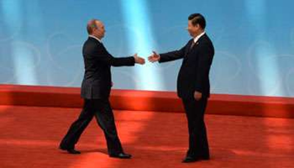 Vladimir Poutine et Xi Jinping à Shanghai, le 21 mai. © MARK RALSTON / AFP