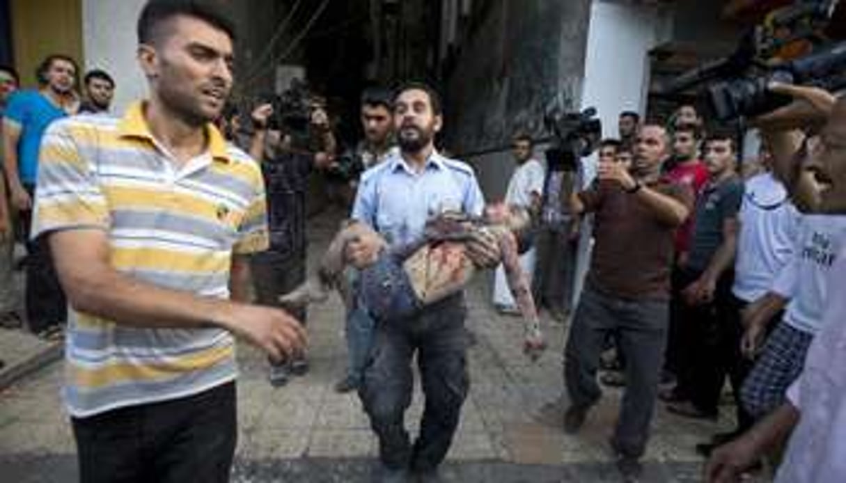 Un enfant palestinien tué lors d’un raid israélien, le 20 juillet 2014 à Gaza. © AFP