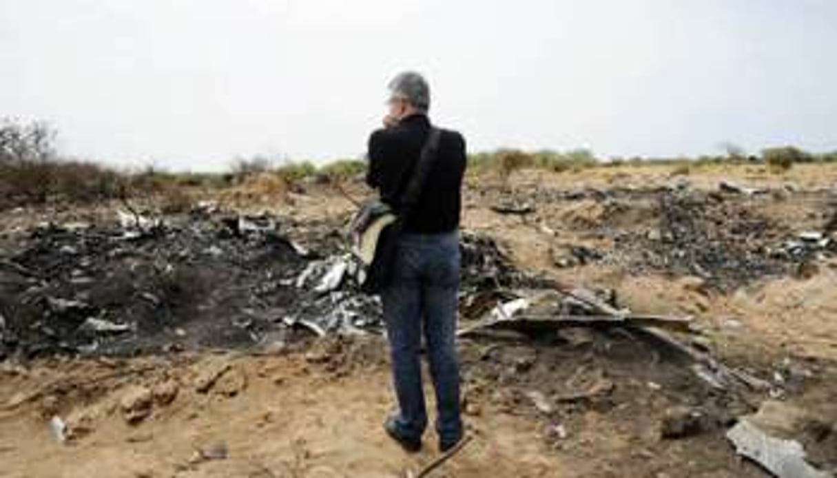Un représentant des proches des victimes sur le site du crash du vol AH 5017, le 26 juillet 2014. © AFP