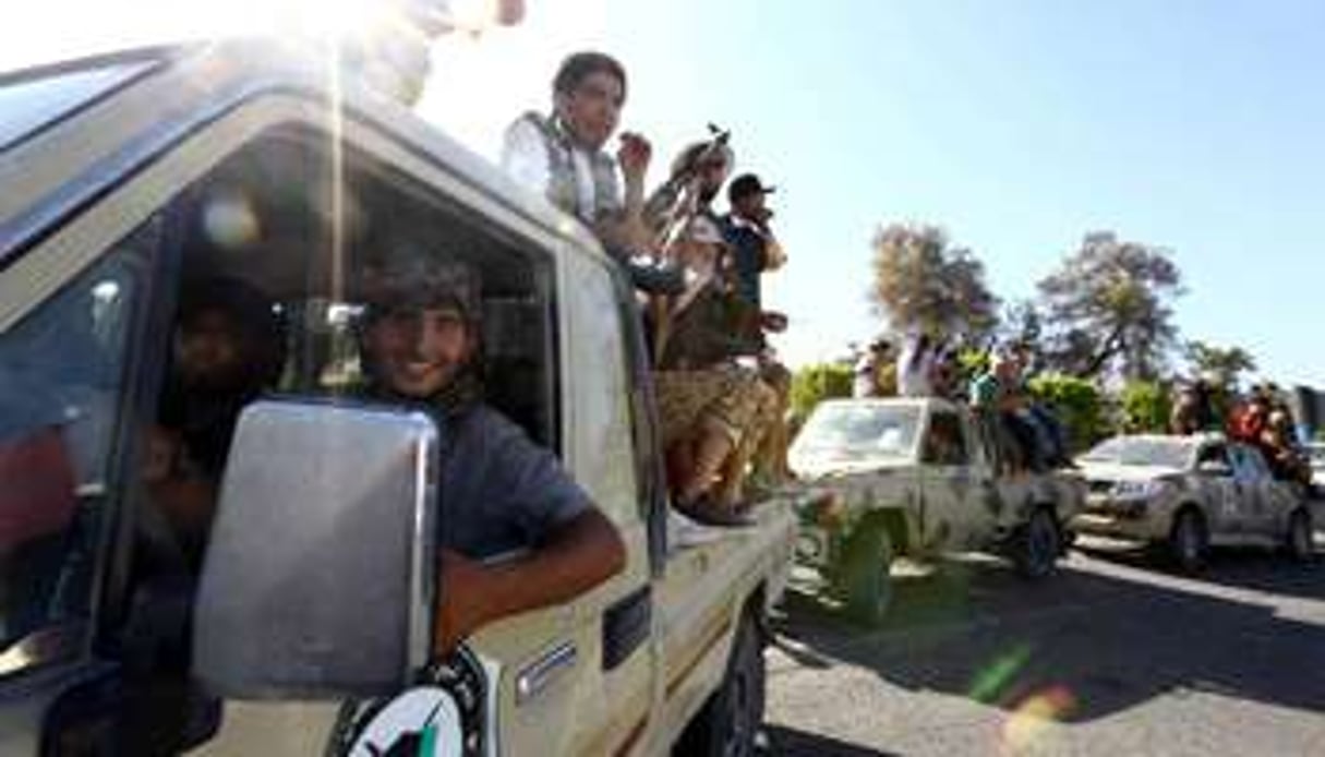 Des miliciens islamistes de Fajr Libya à l’aéroport de Tripoli, le 24 août 2014. © AFP