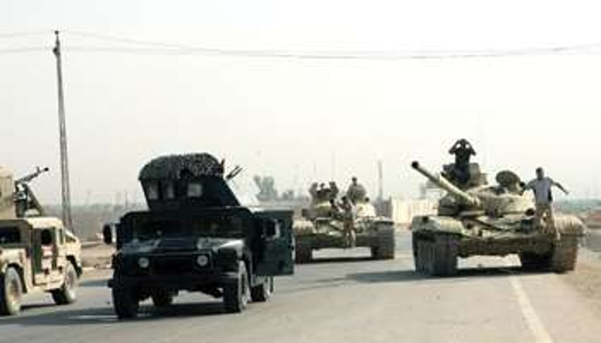 Des soldats irakiens déployés le 18 août 2014 dans la province d’Anbar. © AFP