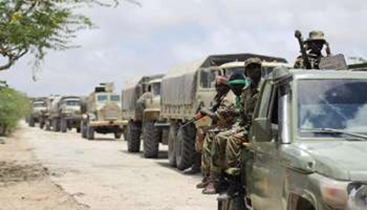 Des soldats de l’Amisom en convoi se dirigent vers la ville de Barawe, le 5 octobre 2014. © AFP