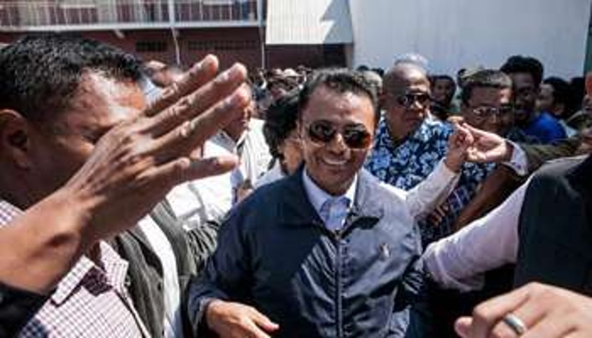 Marc Ravalomanana (c) chez lui à Antananarivo le 13 octobre 2014. © AFP