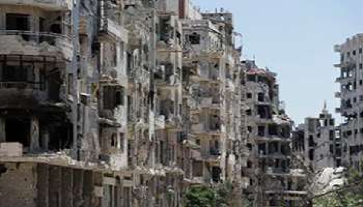 Bâtiments détruits lors de combats à Homs, le 3 juin 2014. © AFP