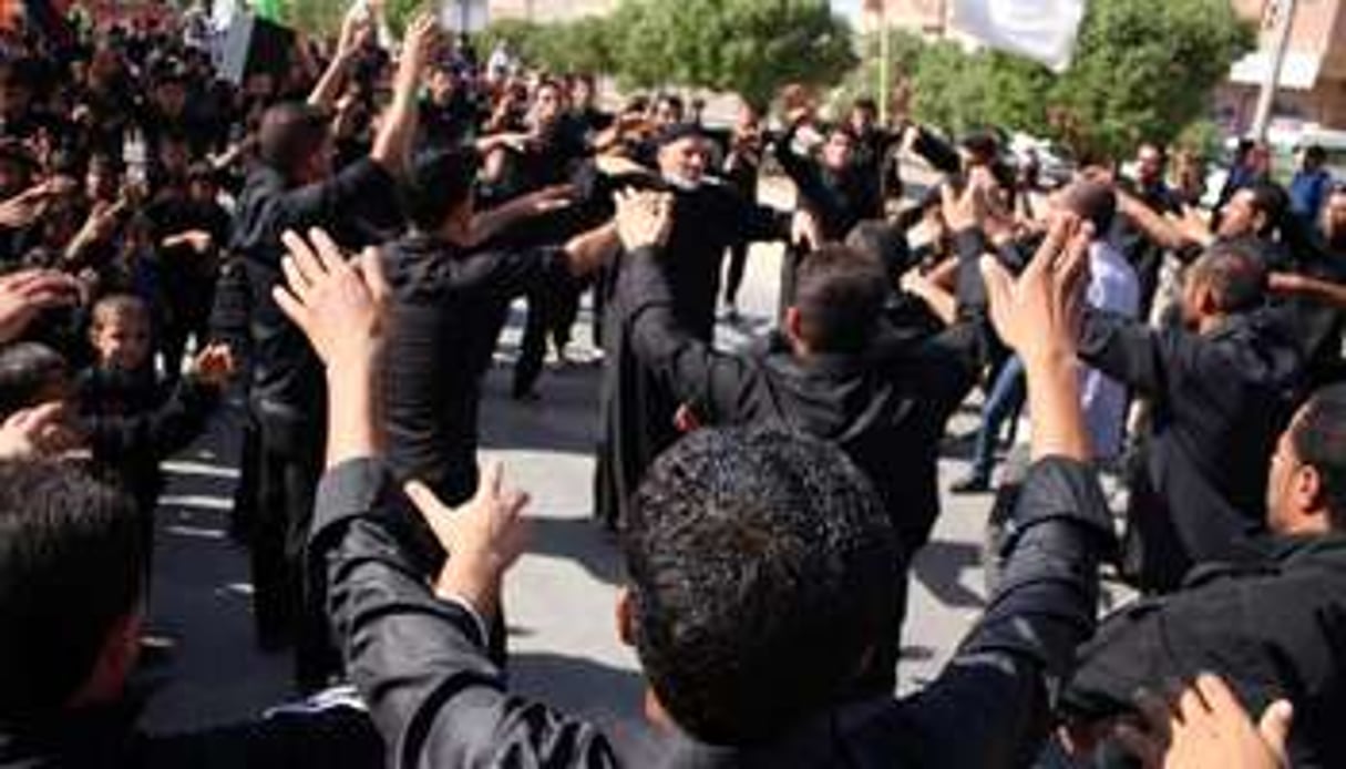 Des fidèles s’autoflagellent à Bassorah, en Irak. © Haidar Mohammed Ali/AFP