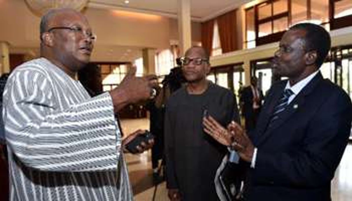 L’opposant Roch Kaboré et Désiré Kadré Ouédraogo, le président de la Commission de la Cedeao. © AFP