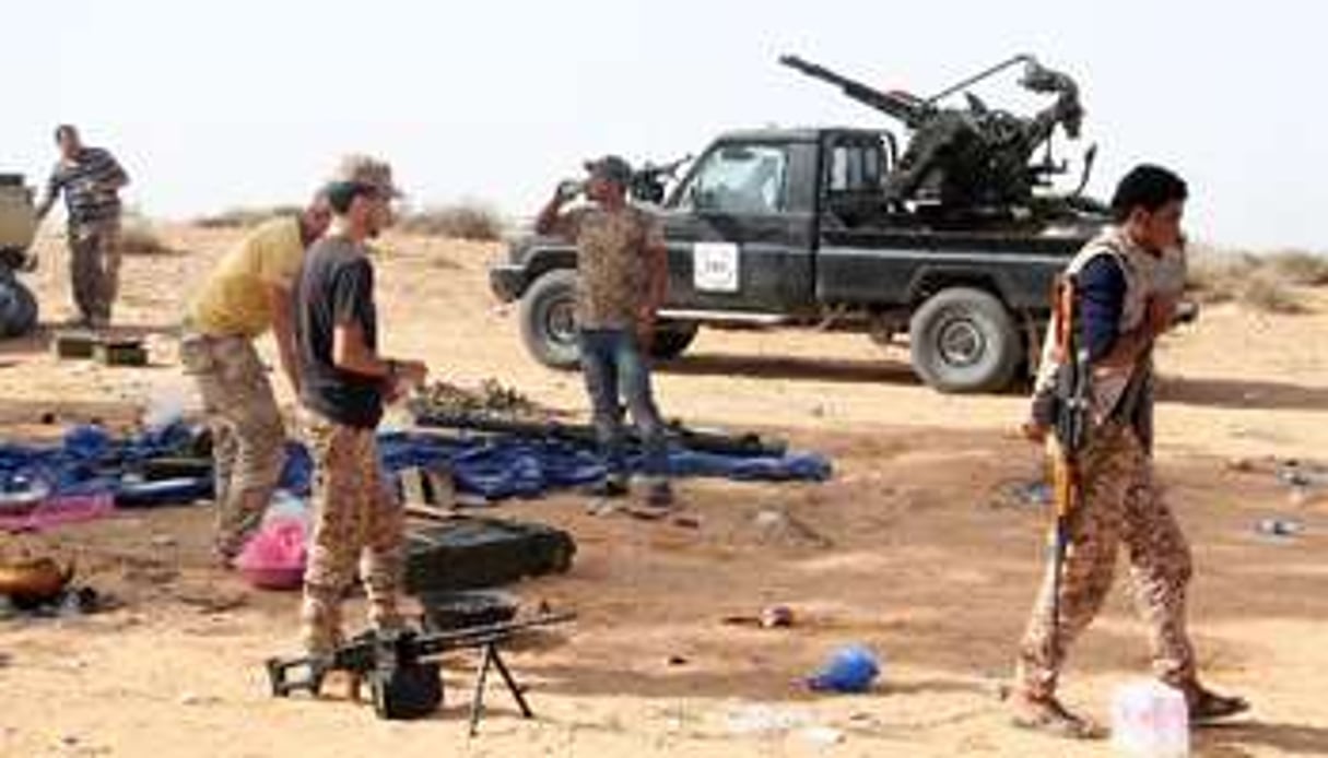 Des combattants de Fajr Libya près de Tripoli, le 13 octobre 2014. © AFP