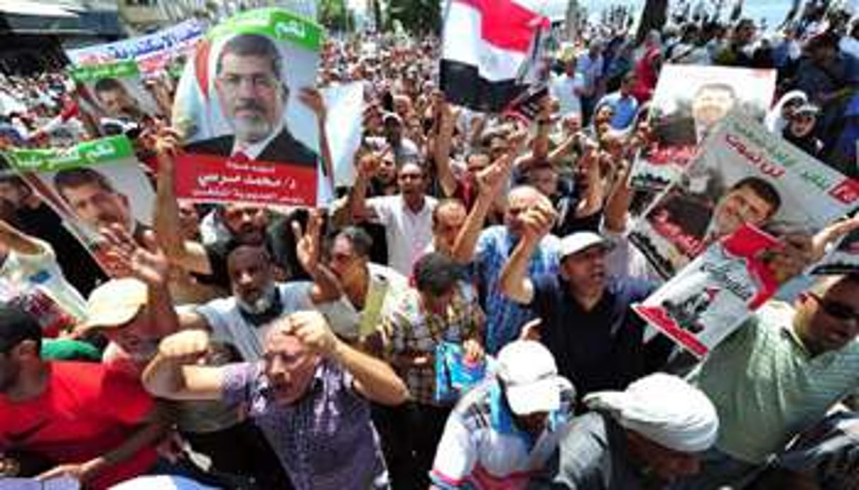 Des sympathisants de l’ex-président égyptien déchu Mohamed Morsi manifestent le 16 août 2013. © AFP