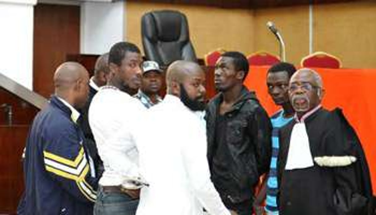 Des co-accusés de Simone Gbagbo avant le début de leur audition, à Abidjan, le 6 janvier 2015. © Sia Kambou/AFP