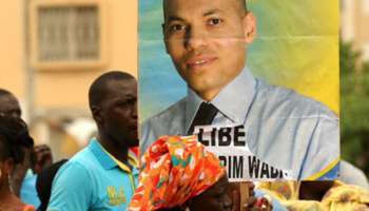 Manifestation pour la libération de Karim Wade en octobre 2013 à Dakar. © AFP
