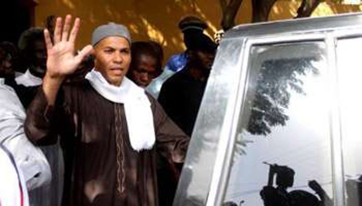 Karim Wade lors de son arrestation, en avril 2013 à Dakar. © AFP
