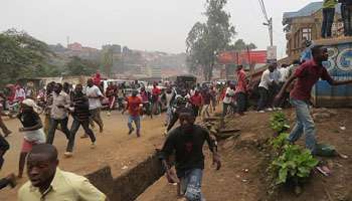 Dispersion des manifestants à Bukavu, le 20 février 2014. © Jean-Baptiste Baderha/AFP