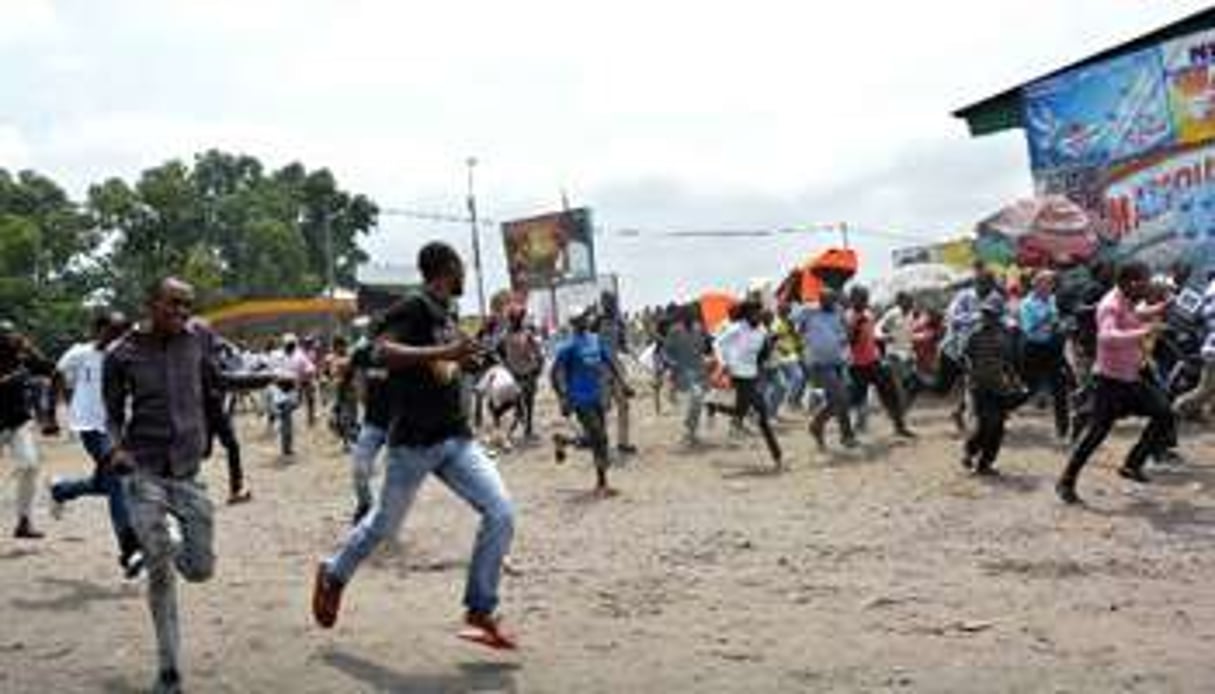 Manifestation contre le report de la présidentielle, le 20 juin 2014 à Kinshasa. © AFP