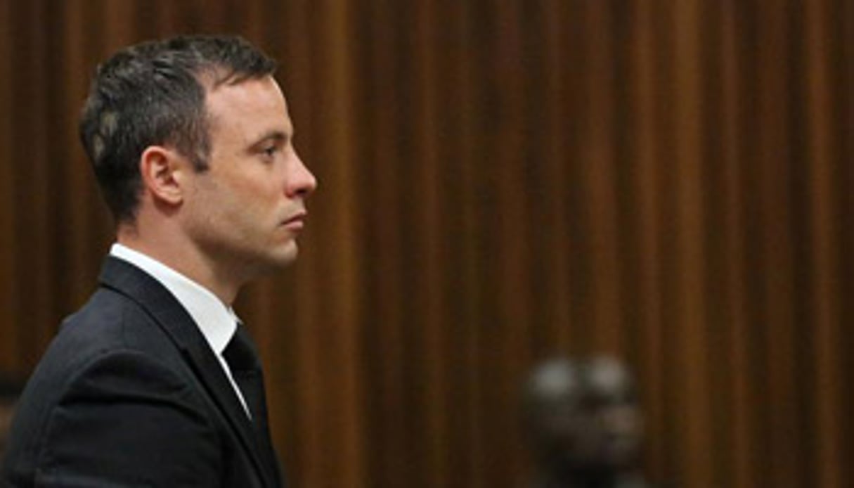 Oscar Pistorius sur le banc des accusés le 21 octobre 2014, lors de son procès à Pretoria. © Themba Hadebe / AFP