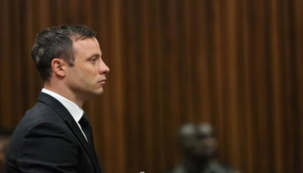 Oscar Pistorius sur le banc des accusés le 21 octobre 2014, lors de son procès à Pretoria. © AFP