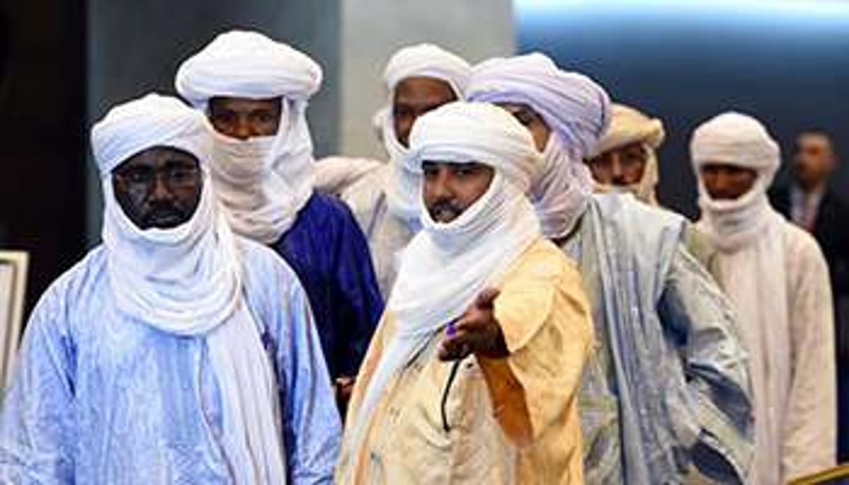 Mahamadou Djeri Maiga, vice-président du MNLA et sa délégation, à Alger, le 16 juillet 2014. © Farouk Batiche/AFP