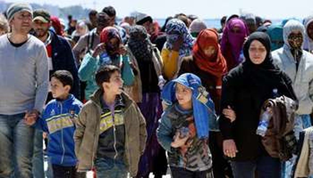 Des migrants sur le port d’Augusta, le 22 avril 2015. © Alberto Pizzoli/AFP