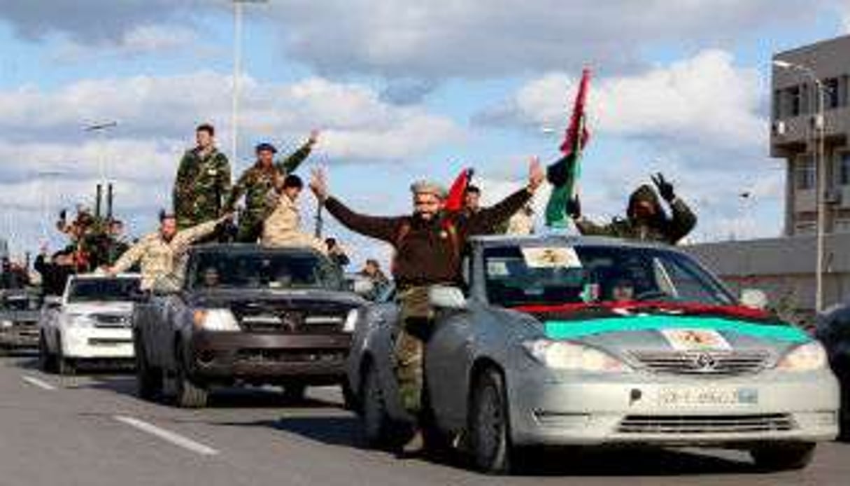 Des miliciens libyens paradent à Tripoli, en février 2012 © Abdel Magid al Fergany/AP/SIPA
