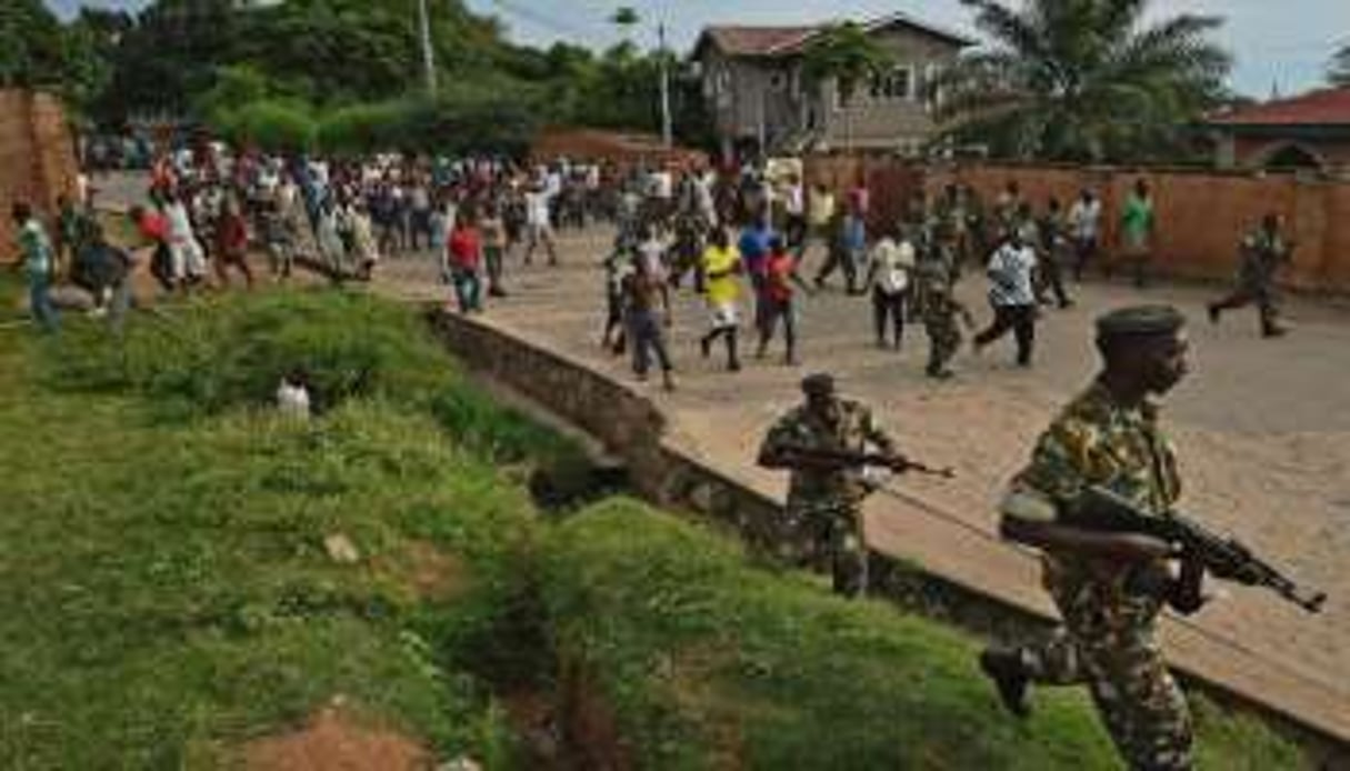 Des manifestants le 21 mai à Musaga. © Carl de Souza/AFP