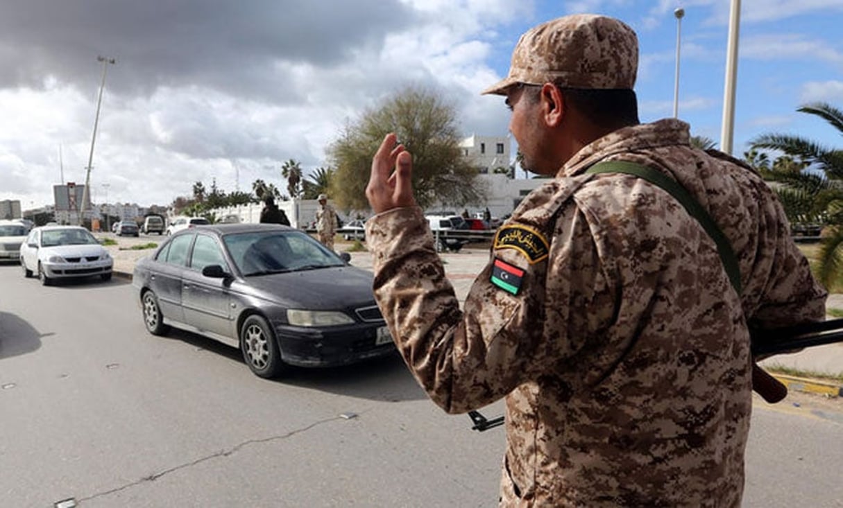 Mahmud Turkia/AFP © Un soldat de l’armée libyenne, en janvier 2014 à Tripoli.