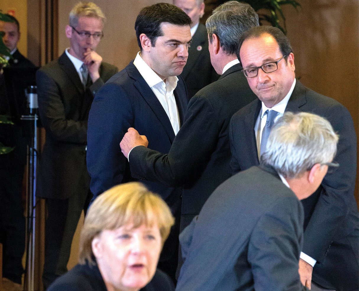 AvecAlexis Tsipras, Angela Merkel, Mario Draghiet Jean-Claude Juncker,à Bruxelles,le 7 juillet. © YVES HERMAN/REUTERS