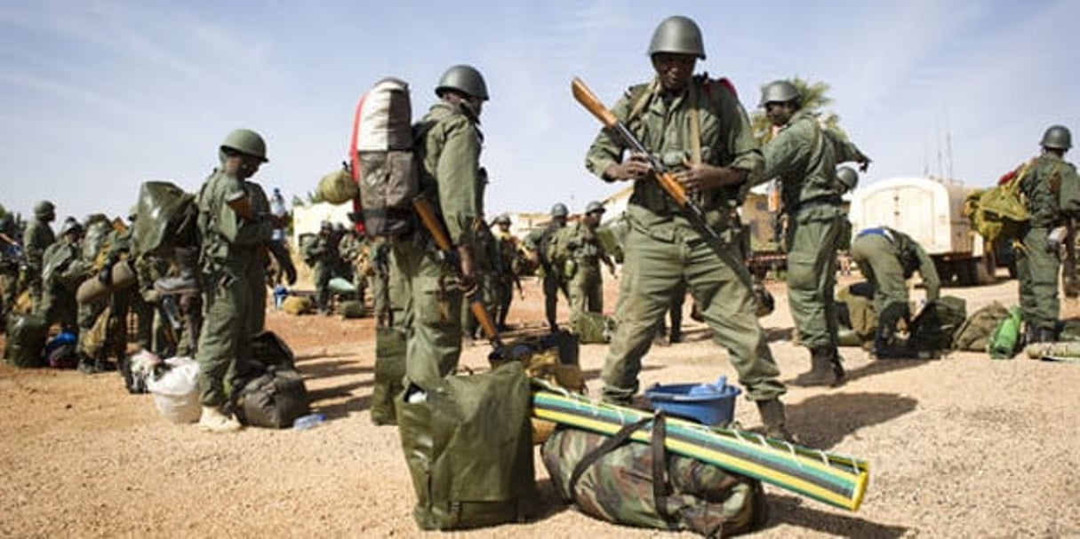 Des soldats maliens près de Gao, le 26 janvier 2013. © Ghislaine Mariette/AFP