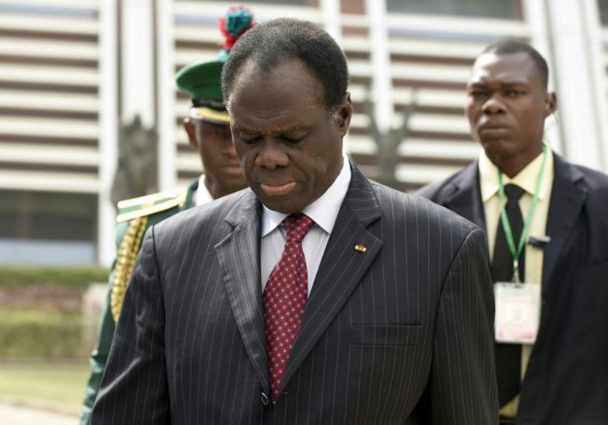 Le président de transition burkinabè, Michel Kafando, en décembre 2014 à Abuja. © Pius Utomi Ekpei/AFP