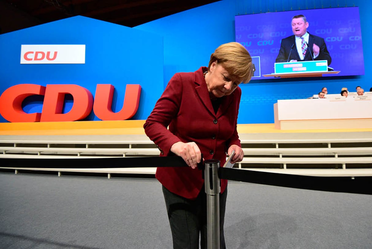 Pendant le congrès de la CDU, son parti, le 15 décembre, à Karlsruhe. © THOMAS LOHNES/GETTY IMAGES/AFP