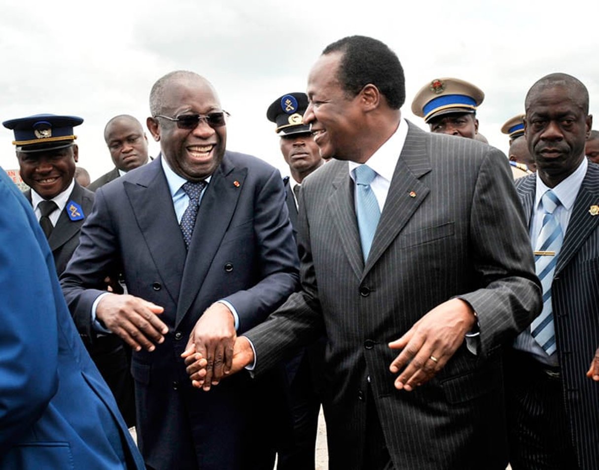 Laurent Gbagbo (à g.) et Blaise Compaoré, le 15 septembre 2009. © KAMBOU SIA/AFP