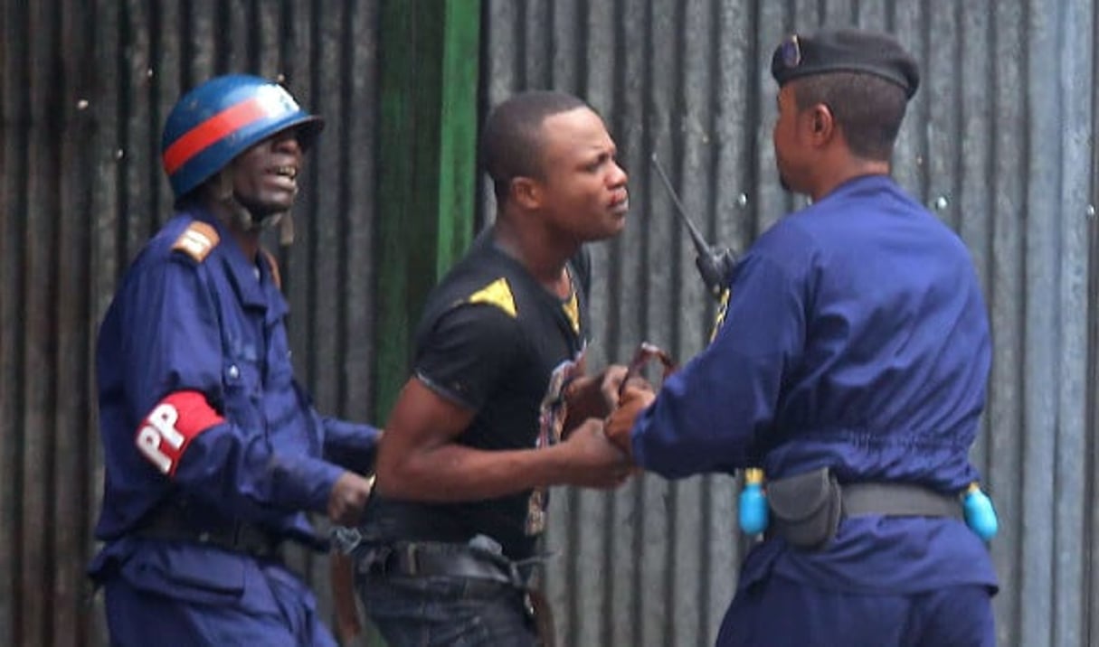 Arrestation d’un manifestant à Kinshasa, le 19 janvier 2015. © John Bompengo/AP/SIPA
