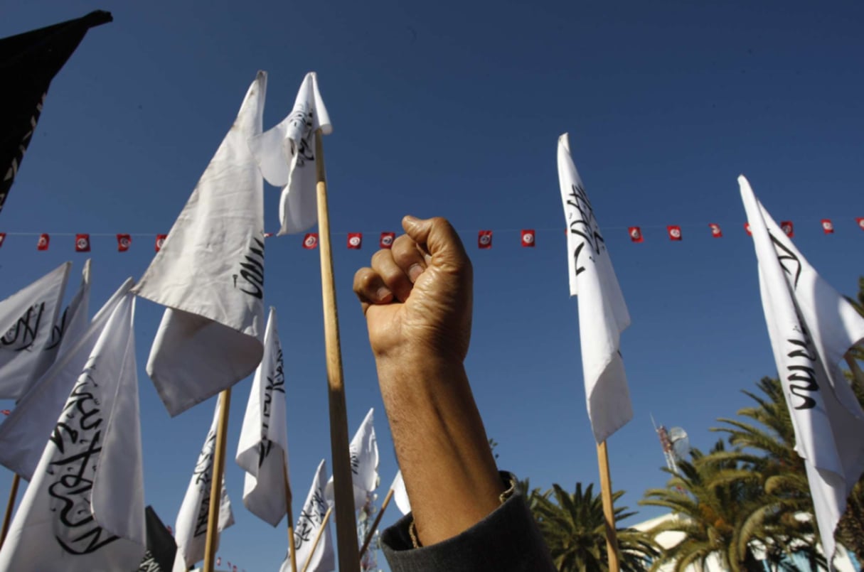 Un membre du parti islamiste Hizb Ettahrir lors d’un rassemblement à Sidi Bouzid en décembre 2013. © Aimen Zine/AP/SIPA