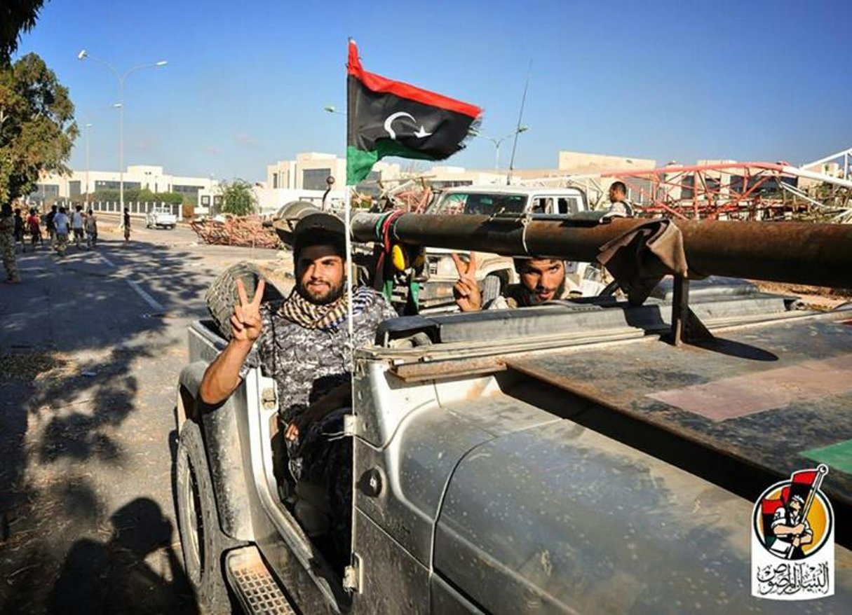 Des soldats des forces gouvernementales libyennes à Syrte, le 10 août 2016. © AFP