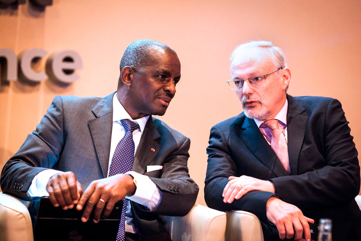 Les sommets franco-africains comme Africa 2016 se multiplient. Ici, Jean Kacou Diagou (à g.), président du groupe NSIA, et Jean-Michel Severino, gérant d’Investisseurs et Partenaires, lors du sommet de l’Élysée pour la paix et la sécurité en Afrique, à Bercy, en 2013. &copy; Camille MILLERAND/JA