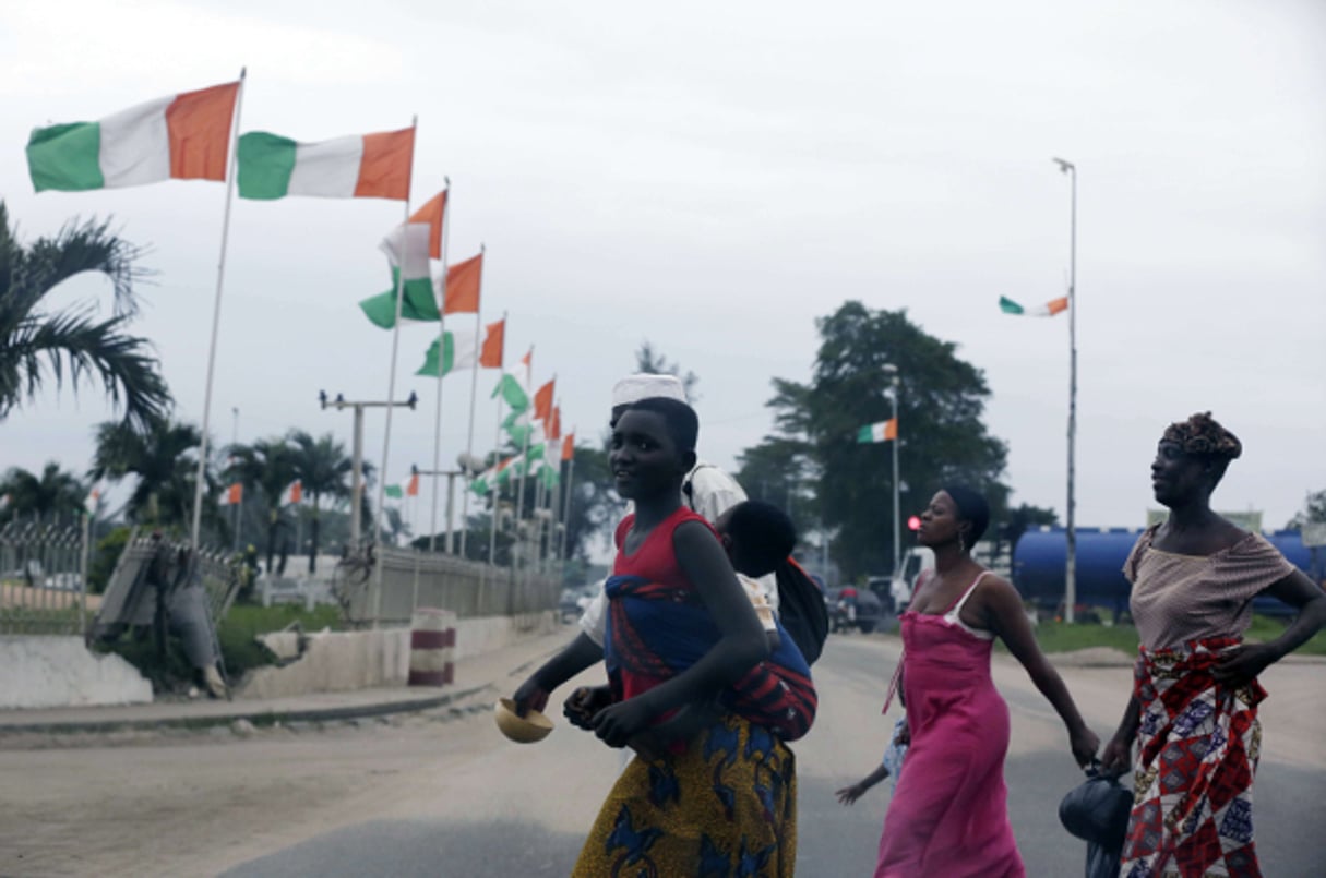 Dans les rues d’Abidjan, en Côte d’Ivoire, en août 2015. © Sunday Alamba/AP/SIPA