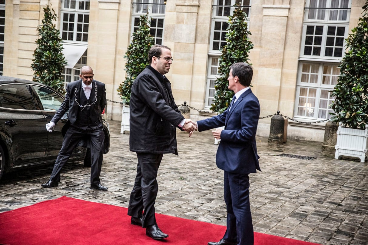 Avec Manuel Valls, son homologue français, à Matignon. © HAMILTON/REA