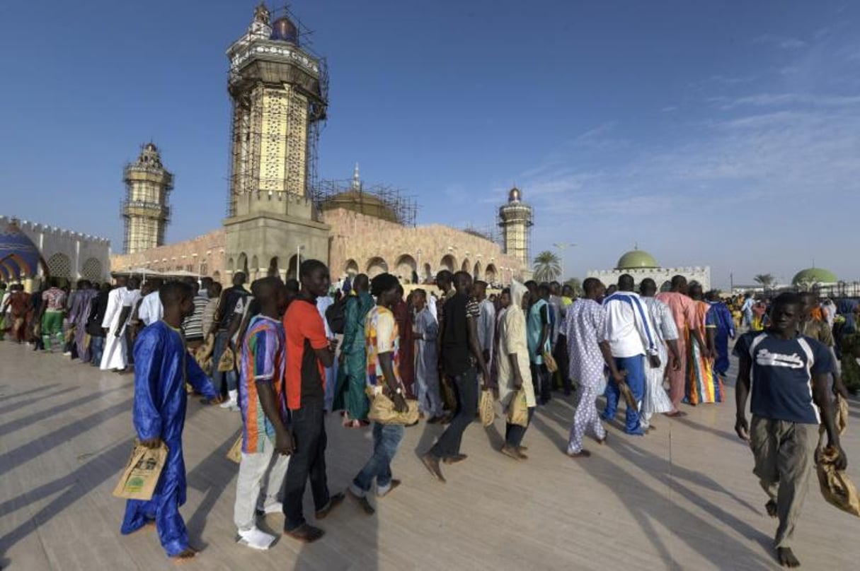 Des fidèles de la confrérie mouride en pèlerinage à Touba au centre du Sénégal, le 19 novembre 2016. © SEYLLOU/AFP