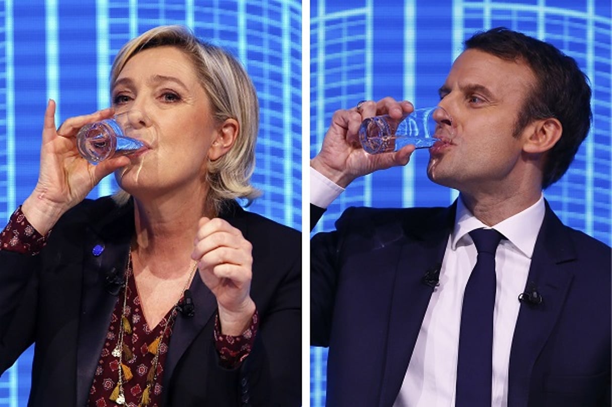 Marine Le Pen, candidate de l’extrême droite et Emmanuel Macron, candidat du mouvement « En marche », au forum « Re-investissons la France », au Carrousel du Louvre, Paris, le 23 février 2017. © Francois Mori/AP/SIPA